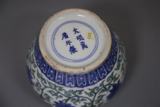 A rare Chinese doucai lotus flower jar, Wanli six character mark and probably of the period, (1573-1619), H. 9.5cm, D. 10.8cm, later